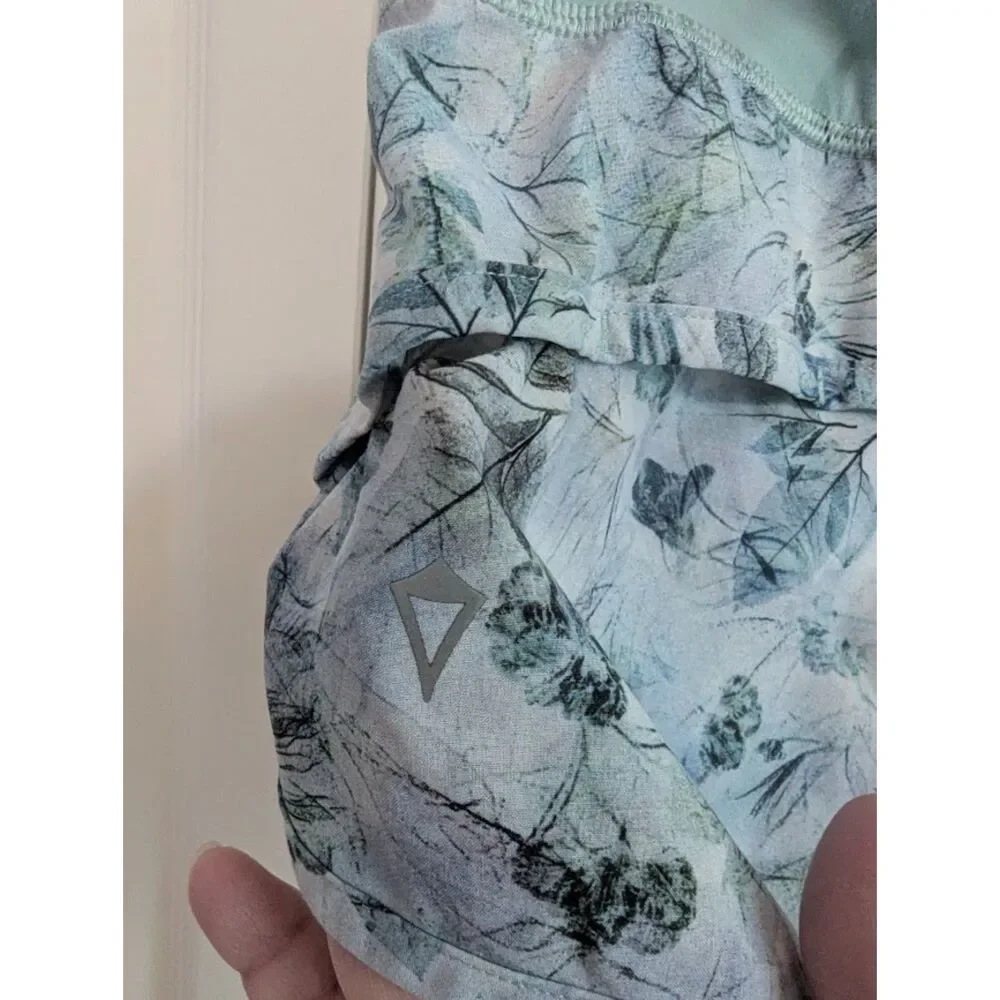 Ivivva by Lululemon pretty Green Floral Speedy Shorts *flaw Girls 10